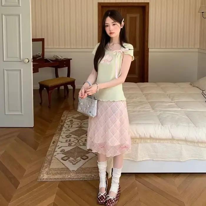 Jupe mi-longue rose à carreaux pour femme, coupe trapèze, taille haute, ajustée, avec nœud décoratif