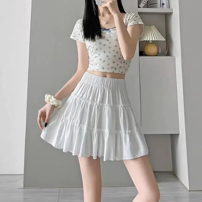 Jupe courte blanche pour femme, nouvelle collection été 2026, taille haute, coupe trapèze, style éva