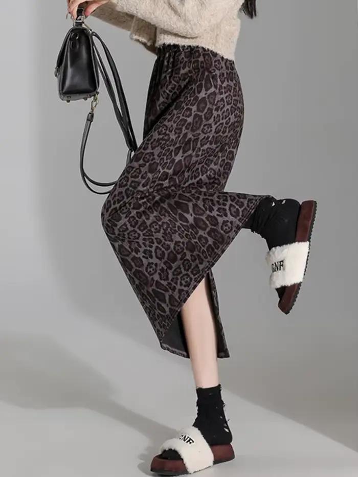 Jupe mi-longue imprimée léopard pour femmes, taille haute élastique, chic, fendue, élégante, dames d