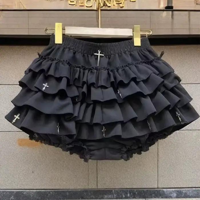 Mini-jupes pour femmes, jupes gothiques à volants superposés avec breloques croisées, shorts intégré