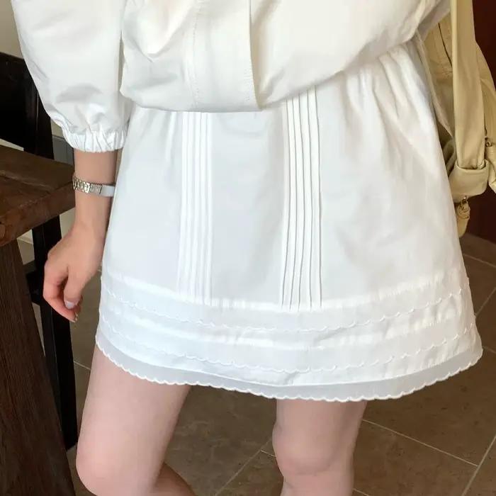 Jupe courte plissée en dentelle à taille élastique pour filles et femmes, collection Printemps 2026
