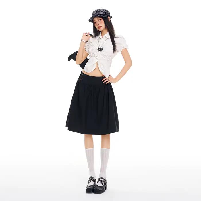 Mini-jupe plissée noire rétro décontractée pour femme, nouvelle collection printemps, coupe ample am