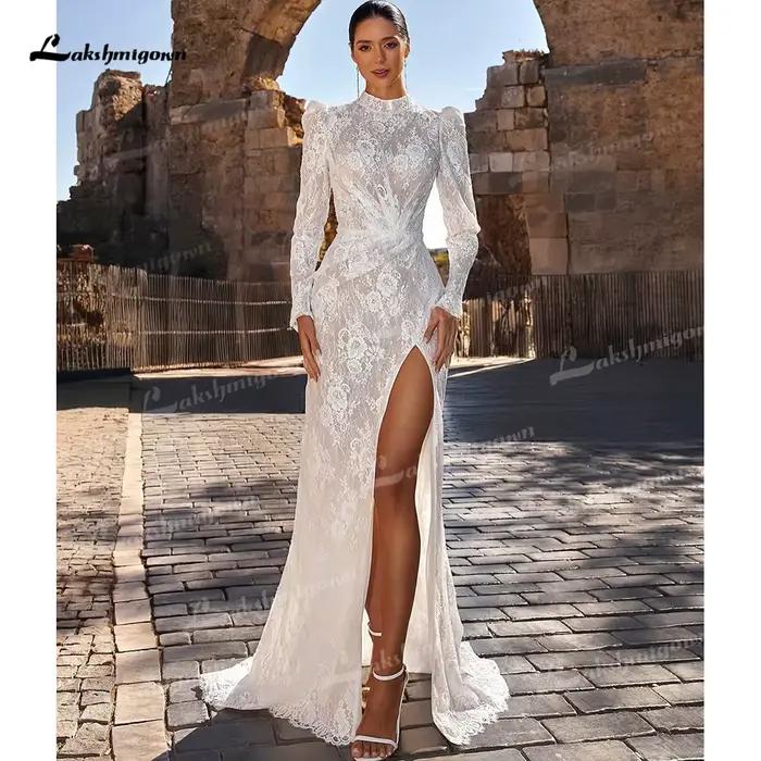 Robe de mariée sirène moderne à col montant, manches longues bouffantes, en dentelle, avec fente hau
