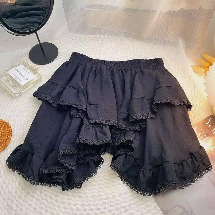 Mini jupe Kawaii à volants pour femmes, taille élastique, blanche, noire, irrégulière, Style japonai
