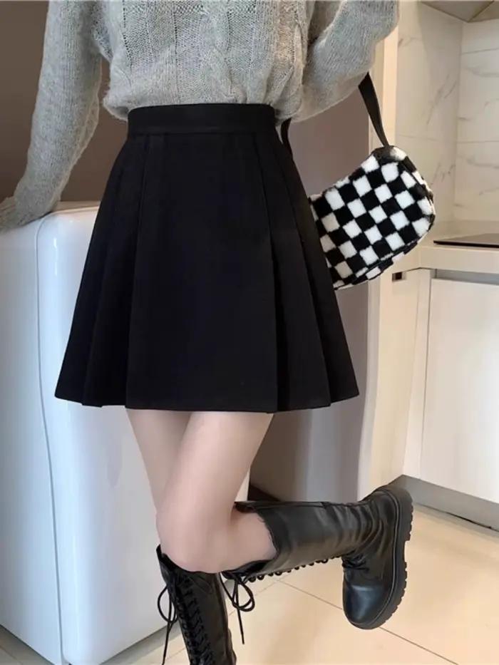 Jupe mini plissée noire élégante en polyester, nouveau style printemps, jupes mi-longues tendance po