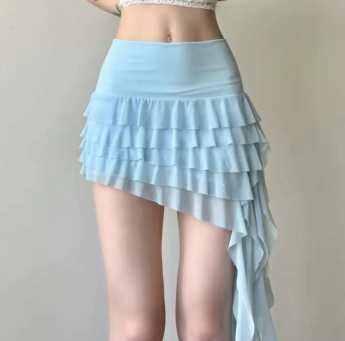 Jupe courte asymétrique à volants en maille transparente pour femme, taille haute, à volants superpo