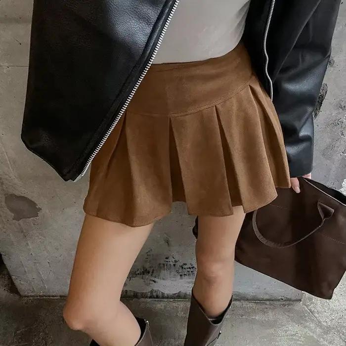 Mini jupe plissée à carreaux marron