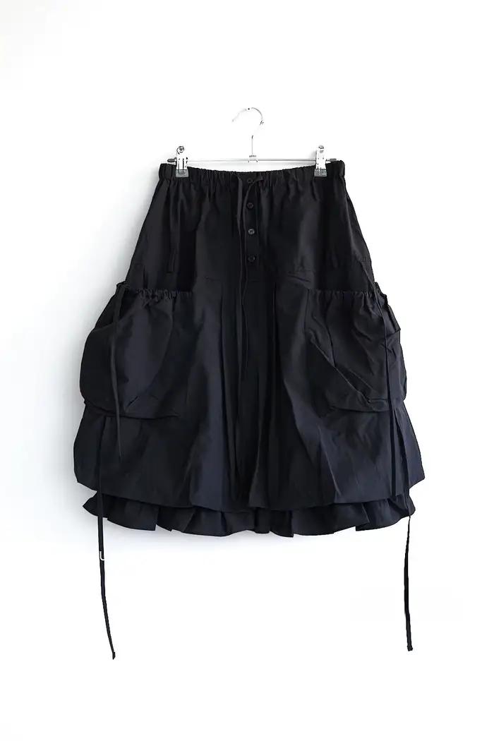 Jupe plissée de style safari polyvalente