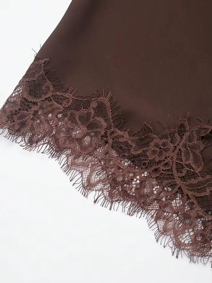 Jupe asymétrique taille haute en dentelle pour femme avec fermeture éclair latérale