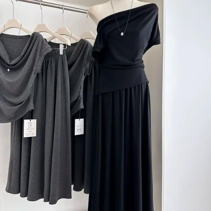 Ensemble deux pièces style coréen pour femme : haut asymétrique et jupe midi taille haute