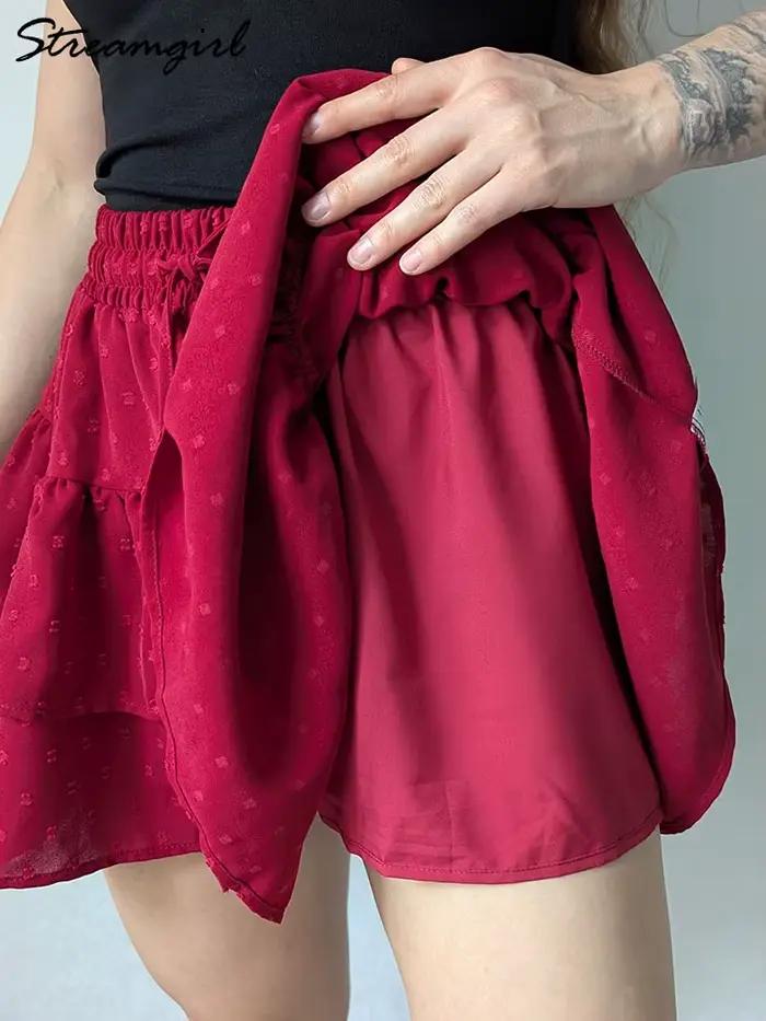 Streamgirl femmes Mini jupes avec Short sous les vêtements d'été cravate une ligne courte blanche plissée à volants