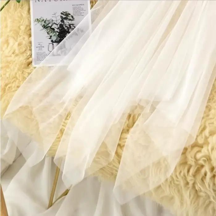 Jupe longue élégante en dentelle transparente et tulle noir et blanc