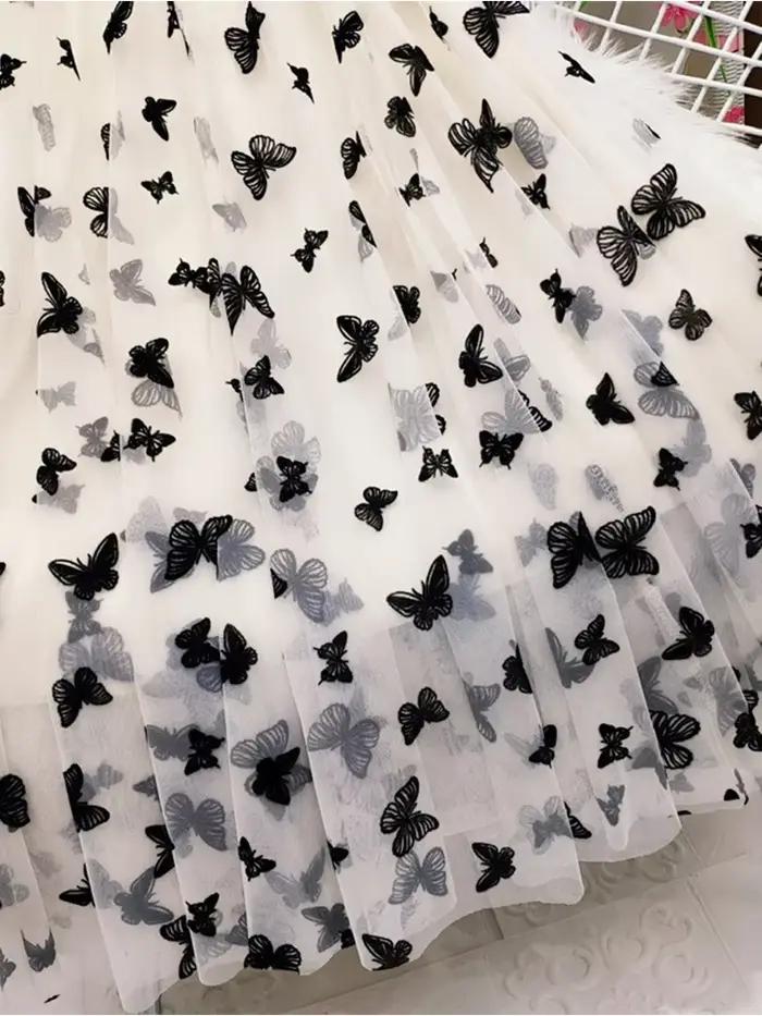 Jupe longue en tulle floqué papillon pour femme
