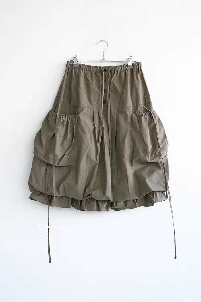 Jupe plissée de style safari polyvalente