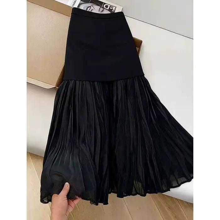Jupe plissée noire à empiècements pour femme