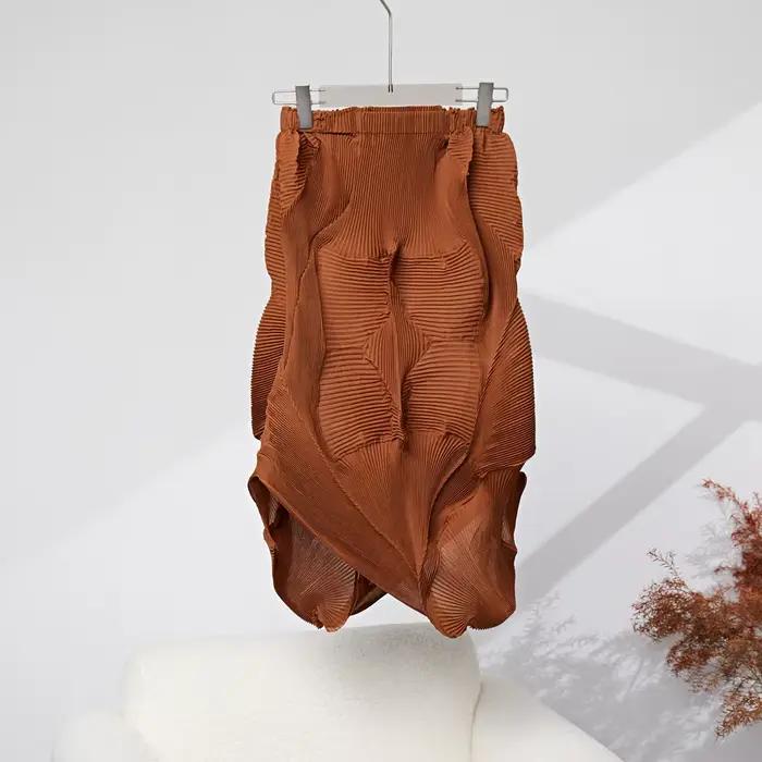 Miyake plissé couleur unie demi-jupe 2025 été nouvelle jupe demi-corps plissée irrégulière femmes mi-longue bourgeon