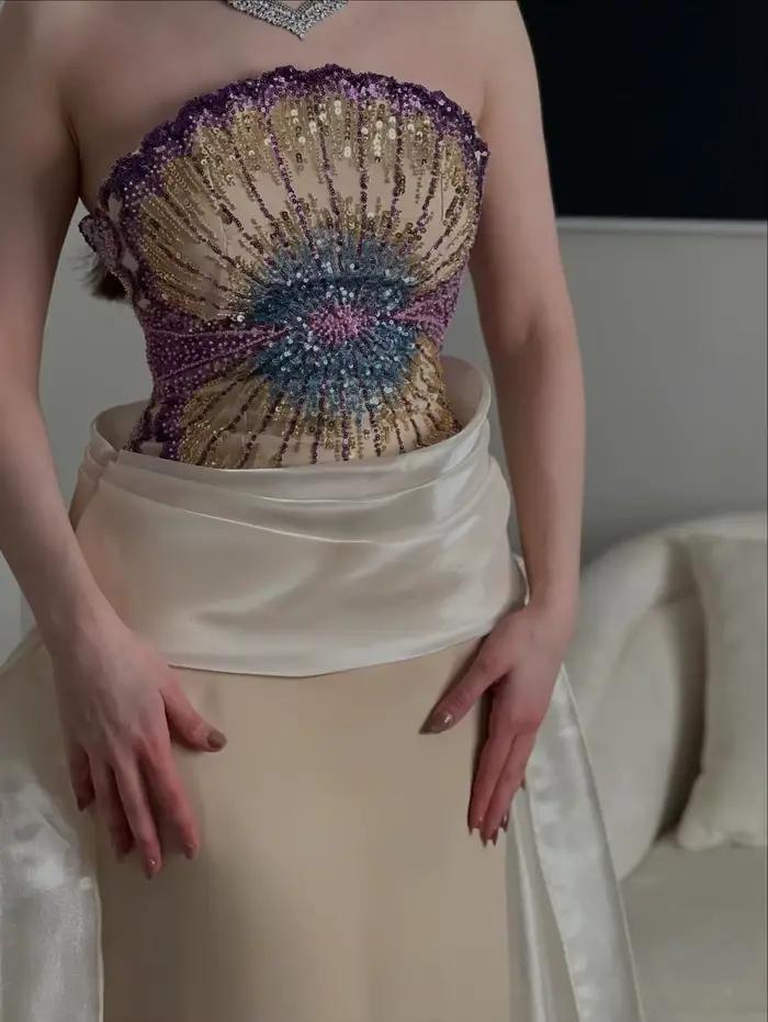 Jupe longue plissée en satin pour femme