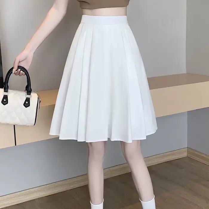 Jupes plissées élastiques à empiècements de couleur unie pour femme