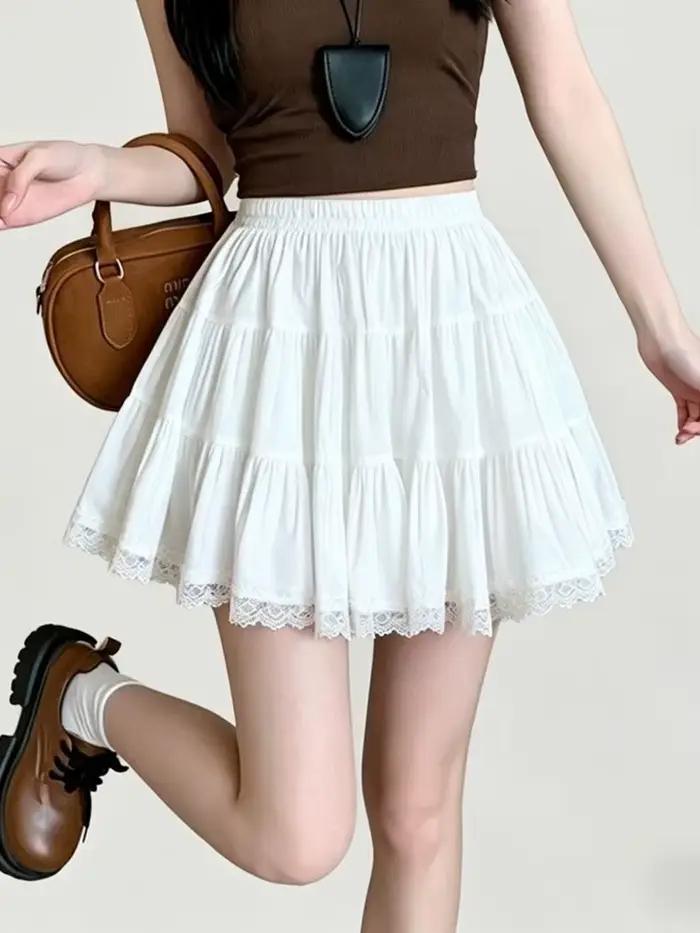 Jupe blanche Kawaii pour femme, taille haute, style chic décontracté, avec patchwork en dentelle, coupe trapèze, pour l'été, style preppy mignon
