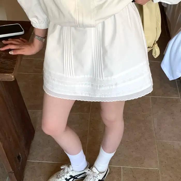 Jupe courte plissée en dentelle à taille élastique pour filles et femmes