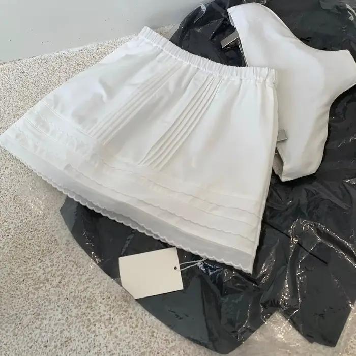 Jupe courte plissée en dentelle à taille élastique pour filles et femmes