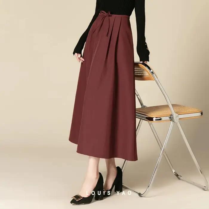 LOUIS YAO vêtements de travail chic jupe femme 2025 automne/hiver déplacements minimaliste luxe plissé nœud orné rétro
