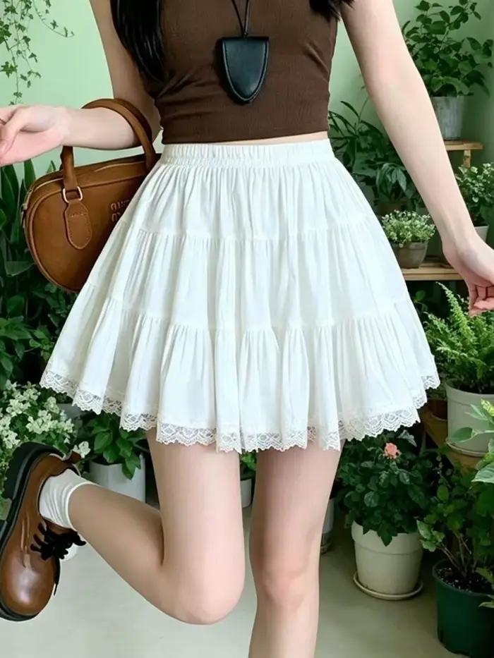 Jupe blanche Kawaii pour femme, taille haute, style chic décontracté, avec patchwork en dentelle, coupe trapèze, pour l'été, style preppy mignon