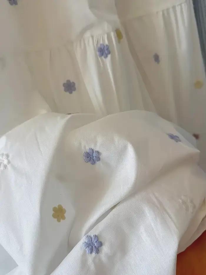 Jupe ZOKI brodée de fleurs douces pour femmes, silhouette élégante, broderie romantique, mode d'été, coupe régulière, tailles moyennes, soirée festive