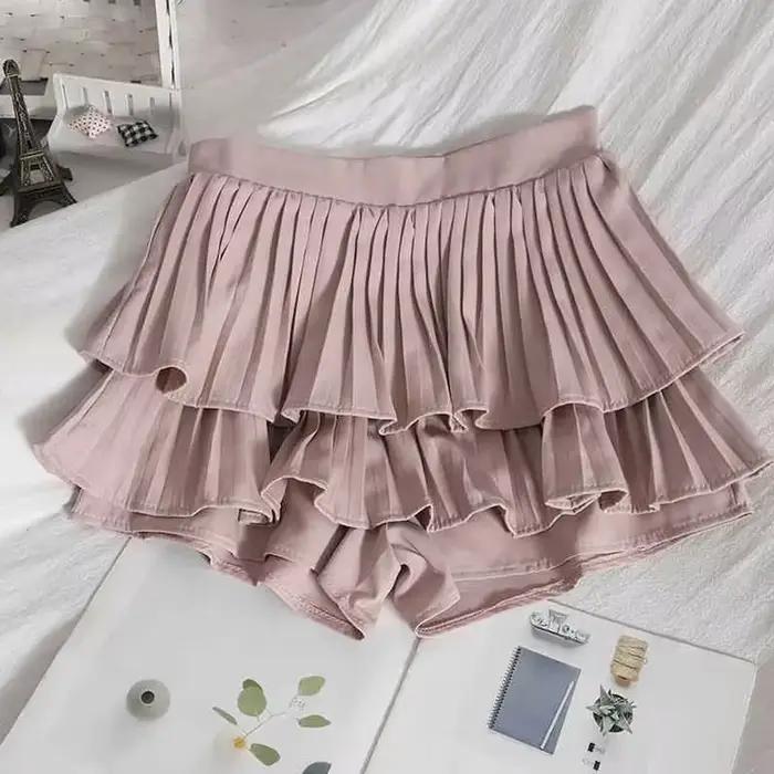Jupe mini plissée noire style grunge avec short intégré à double ceinture