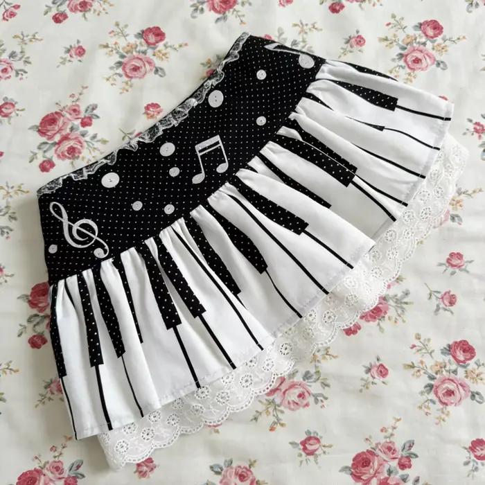 Jupe Esthétique Coquette Femme Noir Blanc Imprimé Clavier de Piano & Notes de Musique Bordure Dentelle 2026