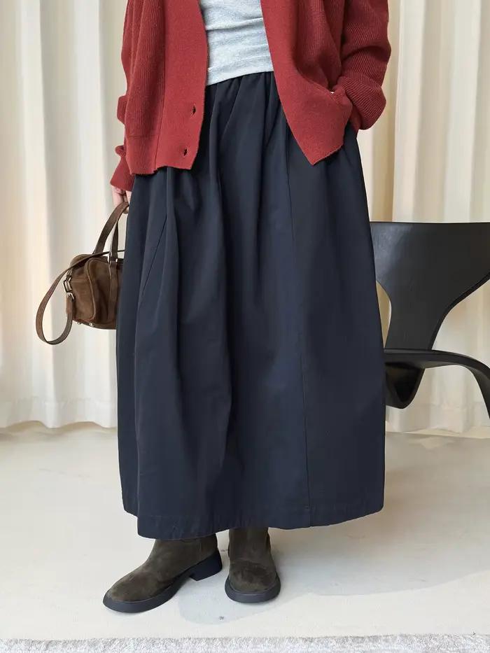 Début du printemps simple taille haute bouton élastique demi-jupe ample minceur décontracté jupe longue pour les femmes
