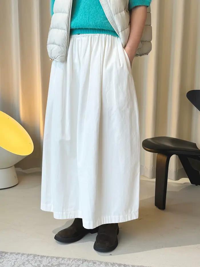 Début du printemps simple taille haute bouton élastique demi-jupe ample minceur décontracté jupe longue pour les femmes