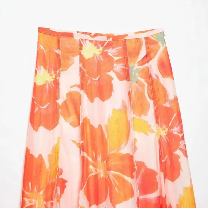 Jupe midi amincissante taille haute imprimée