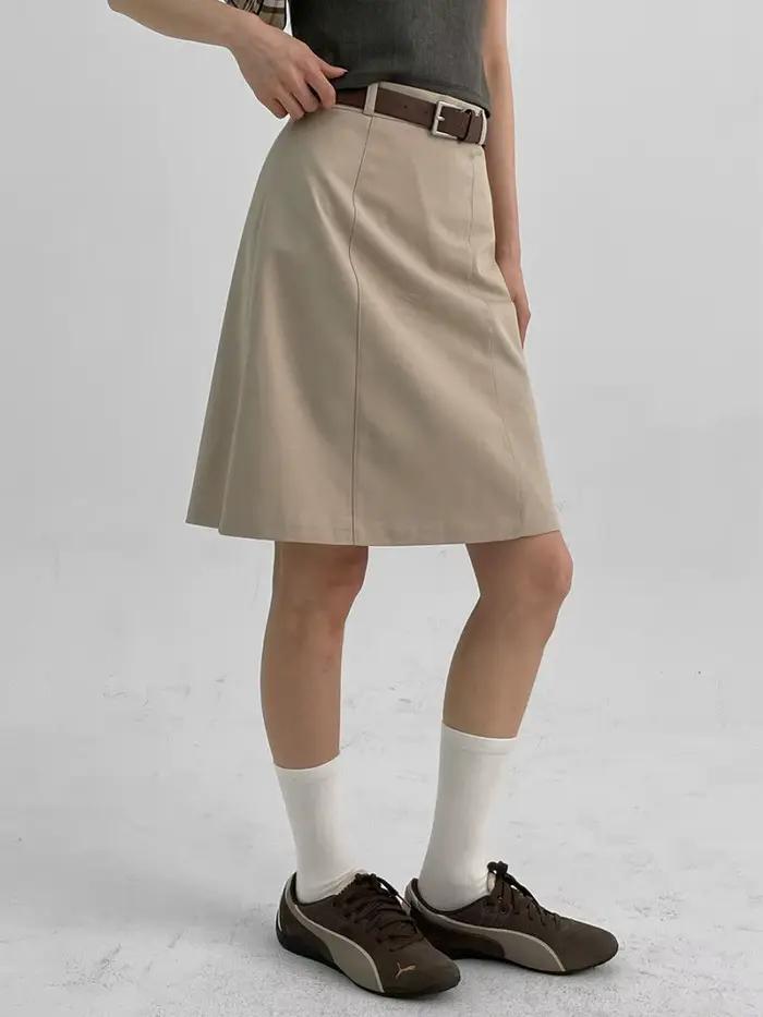 Jupes mi-longues de couleur unie pour femmes