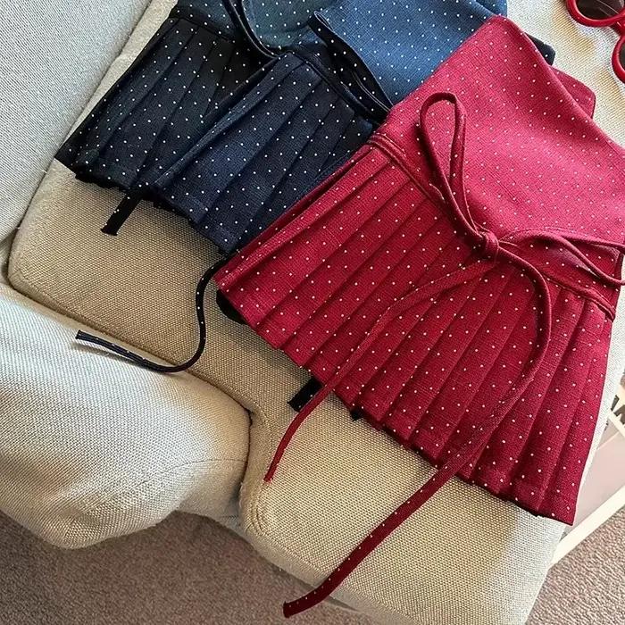Jupe plissée à pois pour femme élégante haute couture polyester haute saison style high street occassions multiples