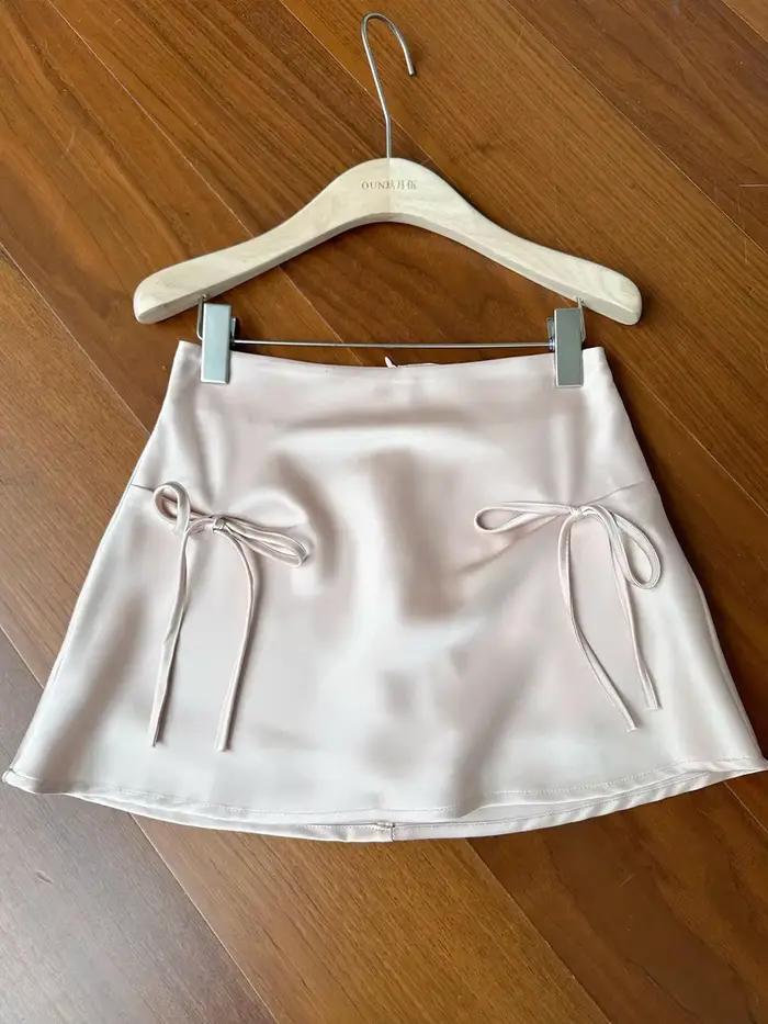 Jupe courte à nœud pour femme