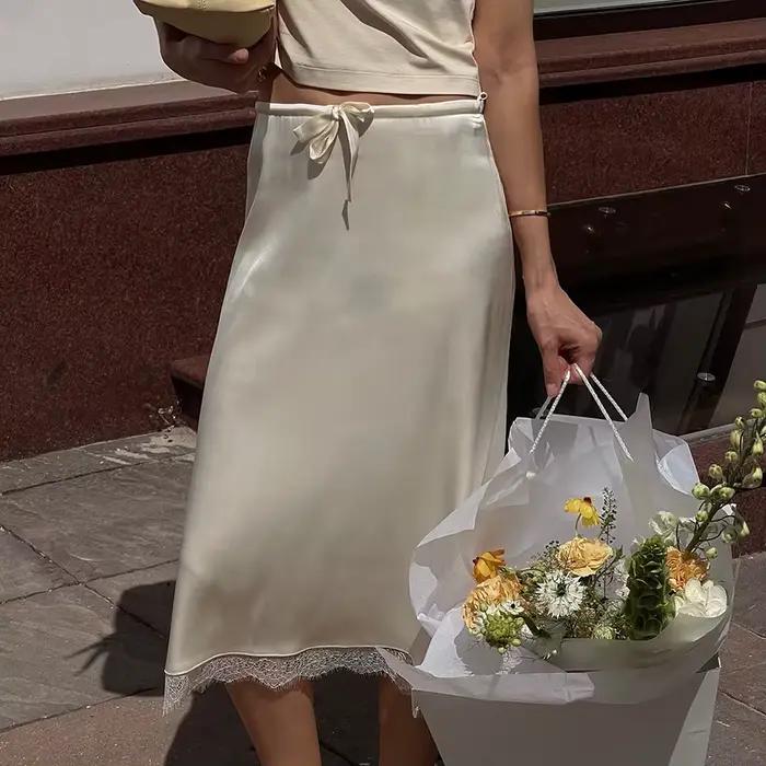 Jupe à bordure en dentelle pour femme, taille haute, patchwork uni, élégante et chic, idéale pour l'été et le bureau