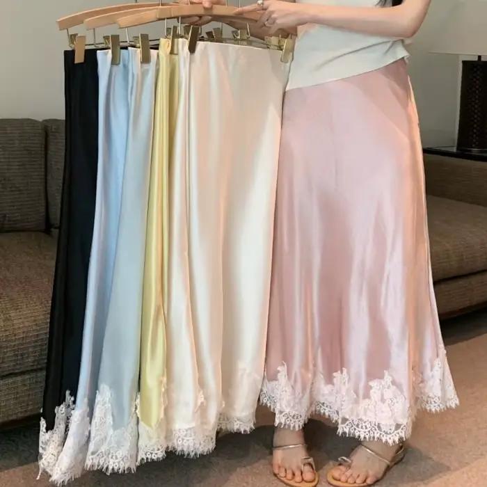 Jupe sirène en tissu satiné effet soyeux avec ourlet en dentelle pour femmes silhouette droite confortable et élégante pour occasions spéciales et tenues quotidiennes