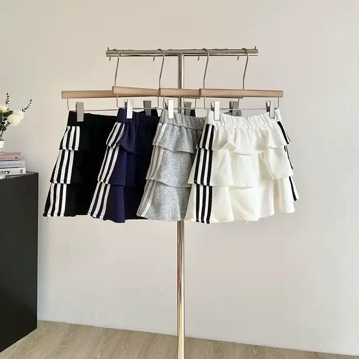 Jupe courte rayée douce polyester été 2026 anti-exposition bouffante ajustement parfait femmes occasions spéciales