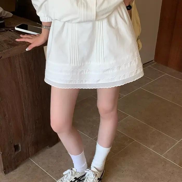 Jupe courte plissée en dentelle à taille élastique pour filles et femmes
