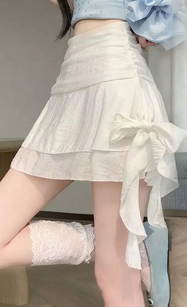 Jupe courte évasée à nœud papillon pour femme