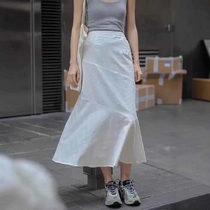 Jupe midi blanche à empiècements pour femme
