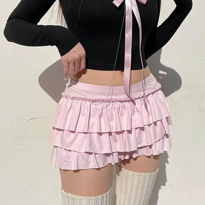 Mini jupes plissées à nœud rose pour femmes