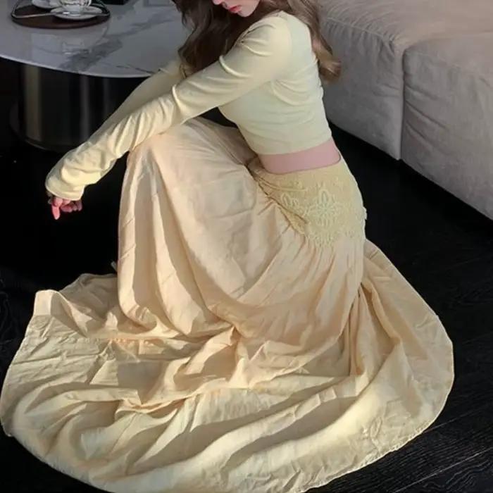 Ensemble deux pièces jupe longue jaune laiteux pour femme