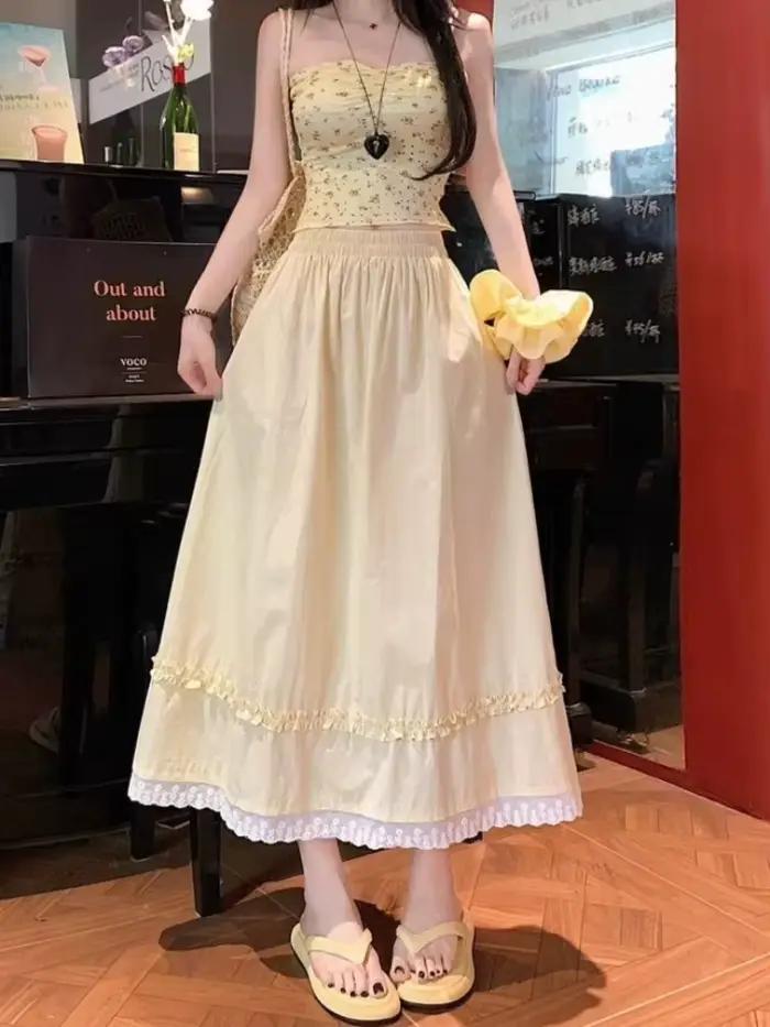 Jupe longue taille haute style coréen pour femme été 2026 jaune avec dentelle douce coupe parapluie élastique large pour toutes les occasions élégante à offrir