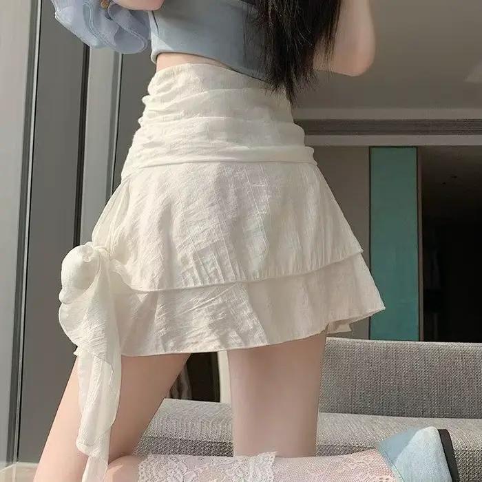 Jupe courte évasée à nœud papillon pour femme