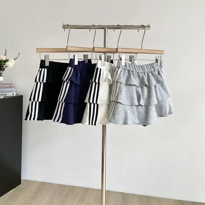 Jupe courte rayée douce polyester été 2026 anti-exposition bouffante ajustement parfait femmes occasions spéciales