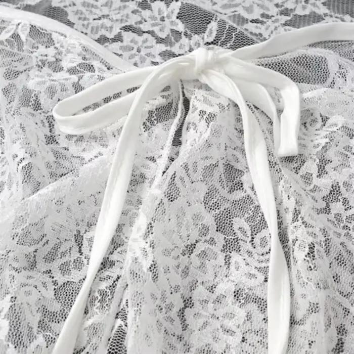 Mini-jupe en dentelle à lacets brodée