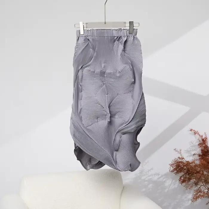 Miyake plissé couleur unie demi-jupe 2025 été nouvelle jupe demi-corps plissée irrégulière femmes mi-longue bourgeon