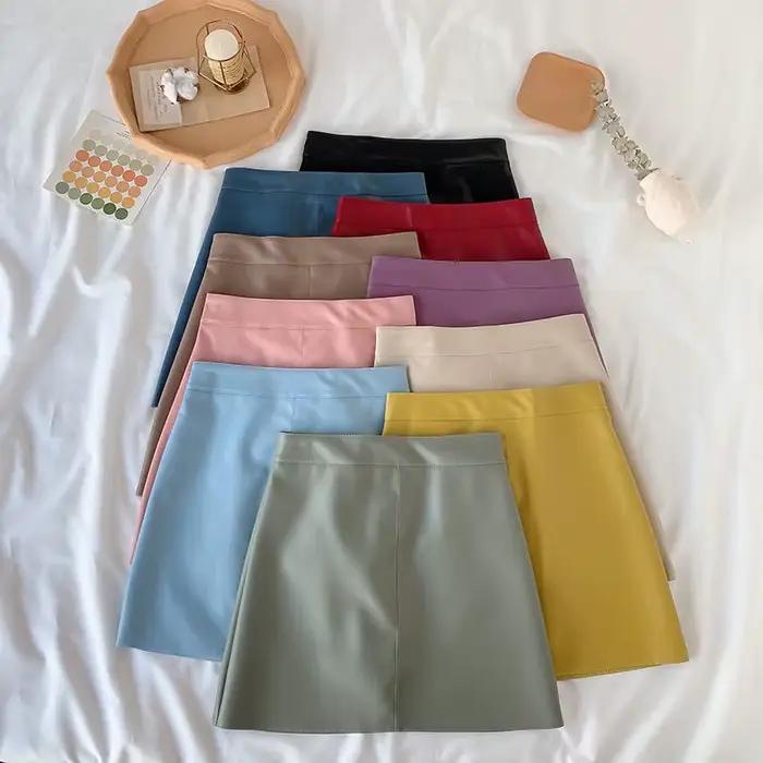 Mini jupe en cuir PU taille haute pour femme